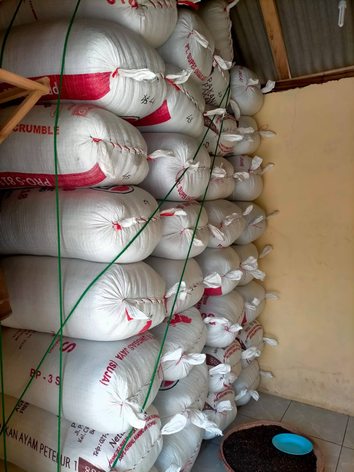 Pile of sacks filled with dried Indonesian cloves, ready for national distribution across the country