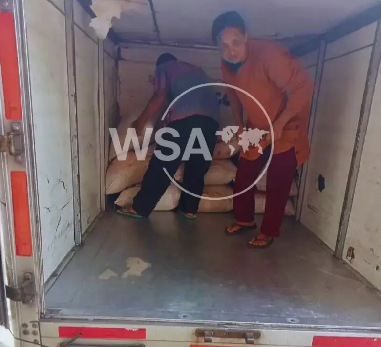 Coffee bags being loaded for international export by Wira Sarwa Asurya